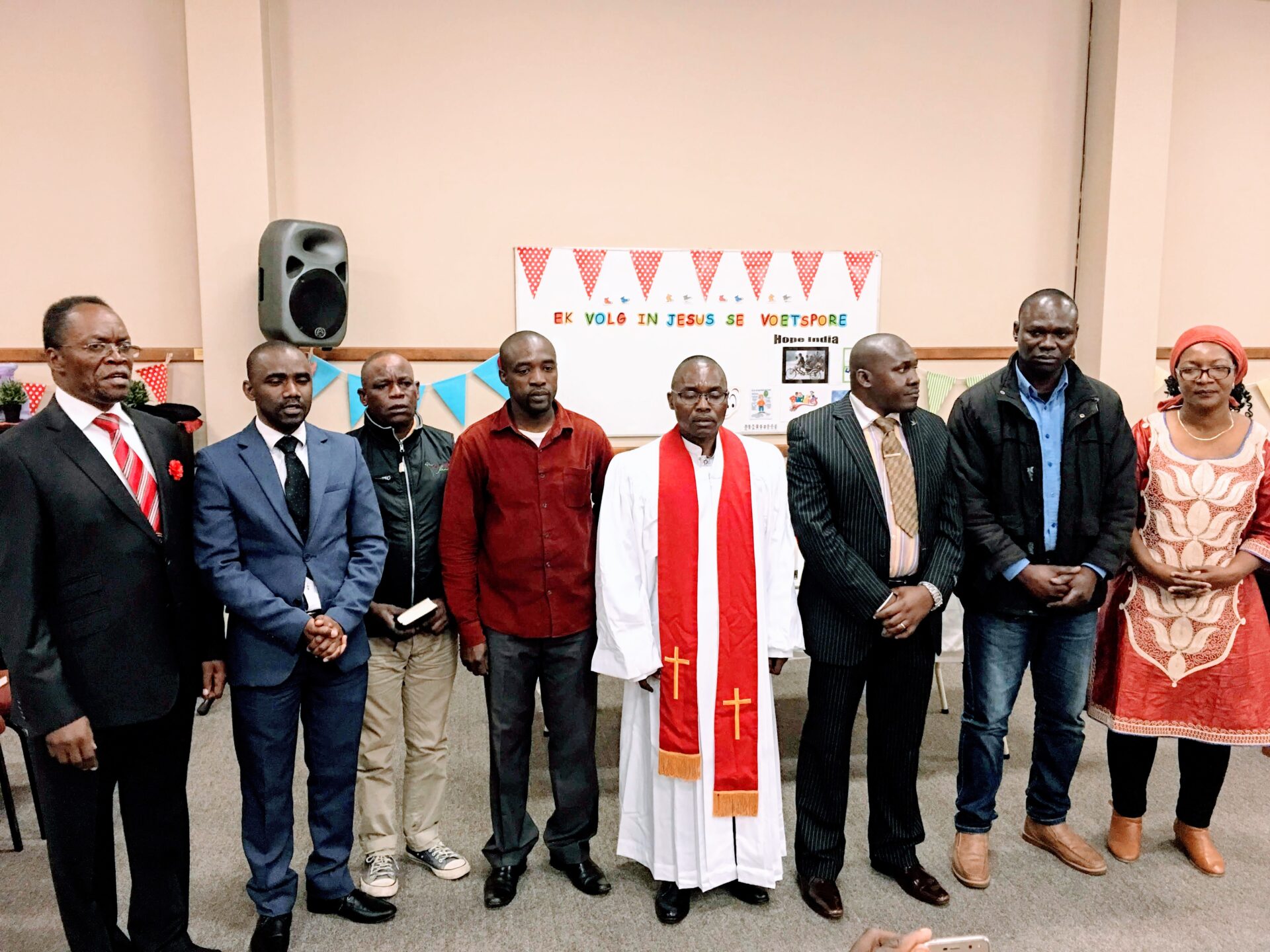 Group Photo With a Priest