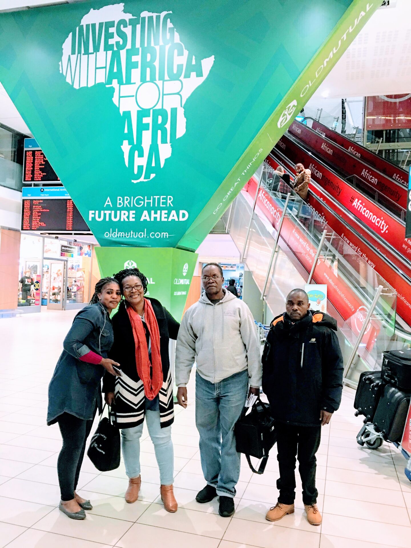 Four Individuals Inside an Airport