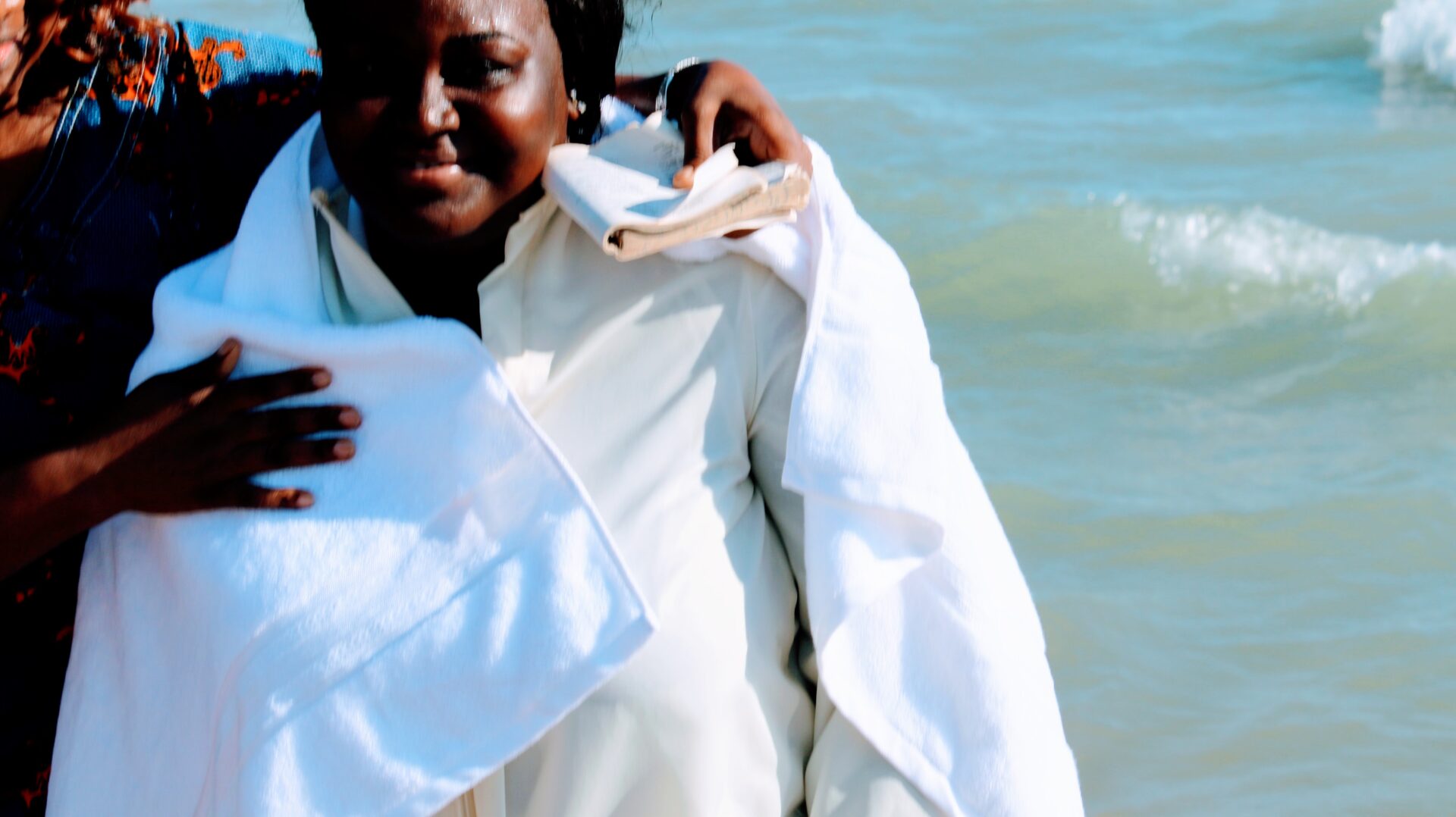 A Woman Wearing White in the Beach