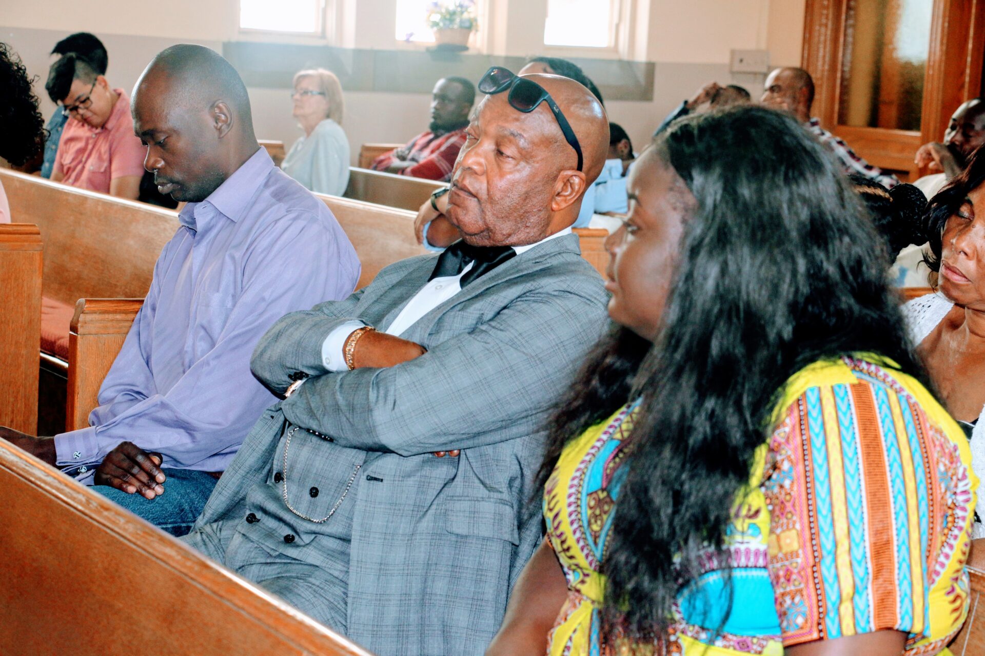 Individuals Listening to Church Service