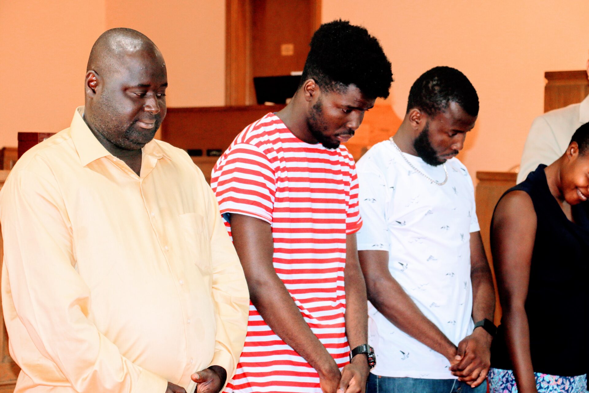 Men Listening to Church Service