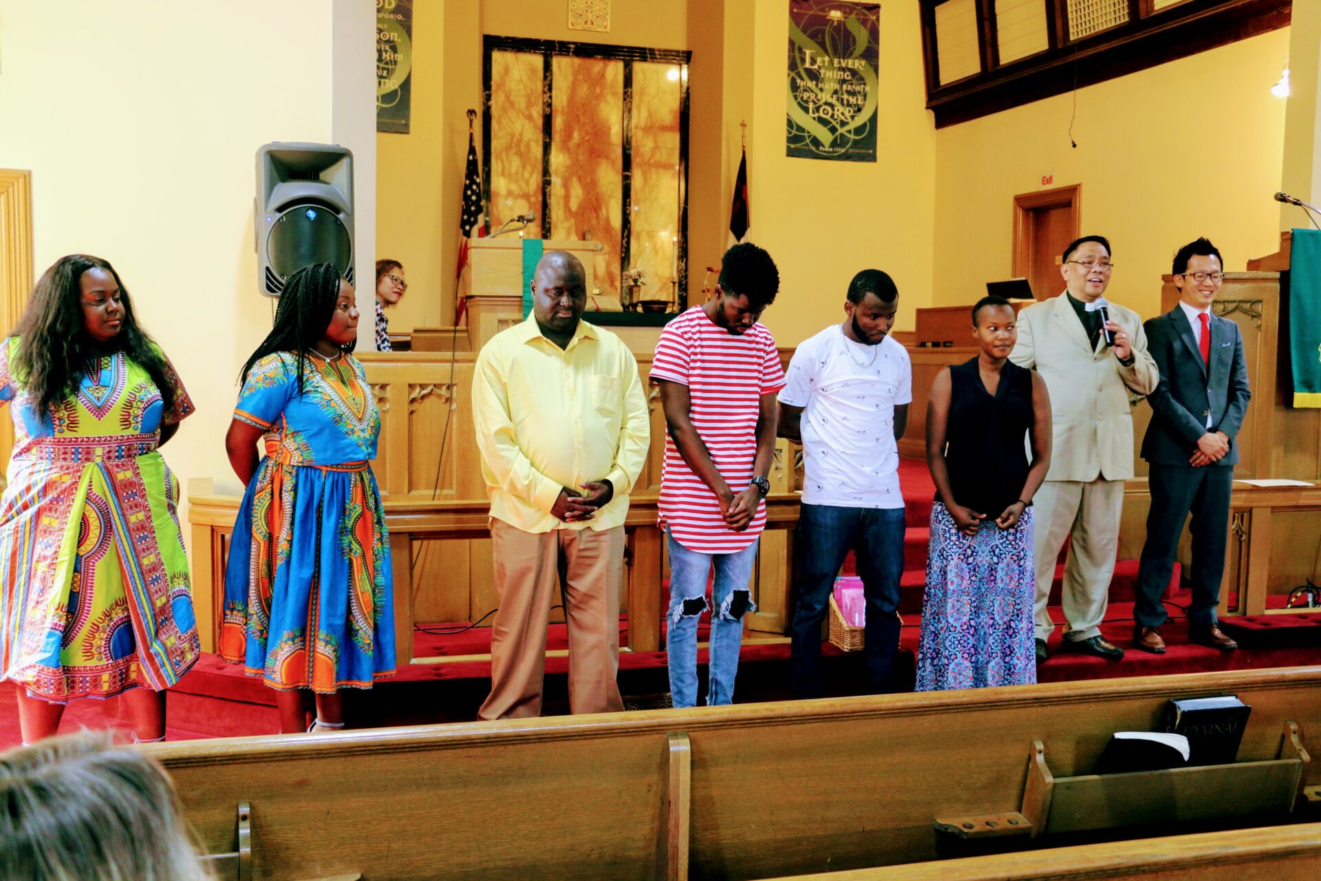 People in Front Attending Church Service