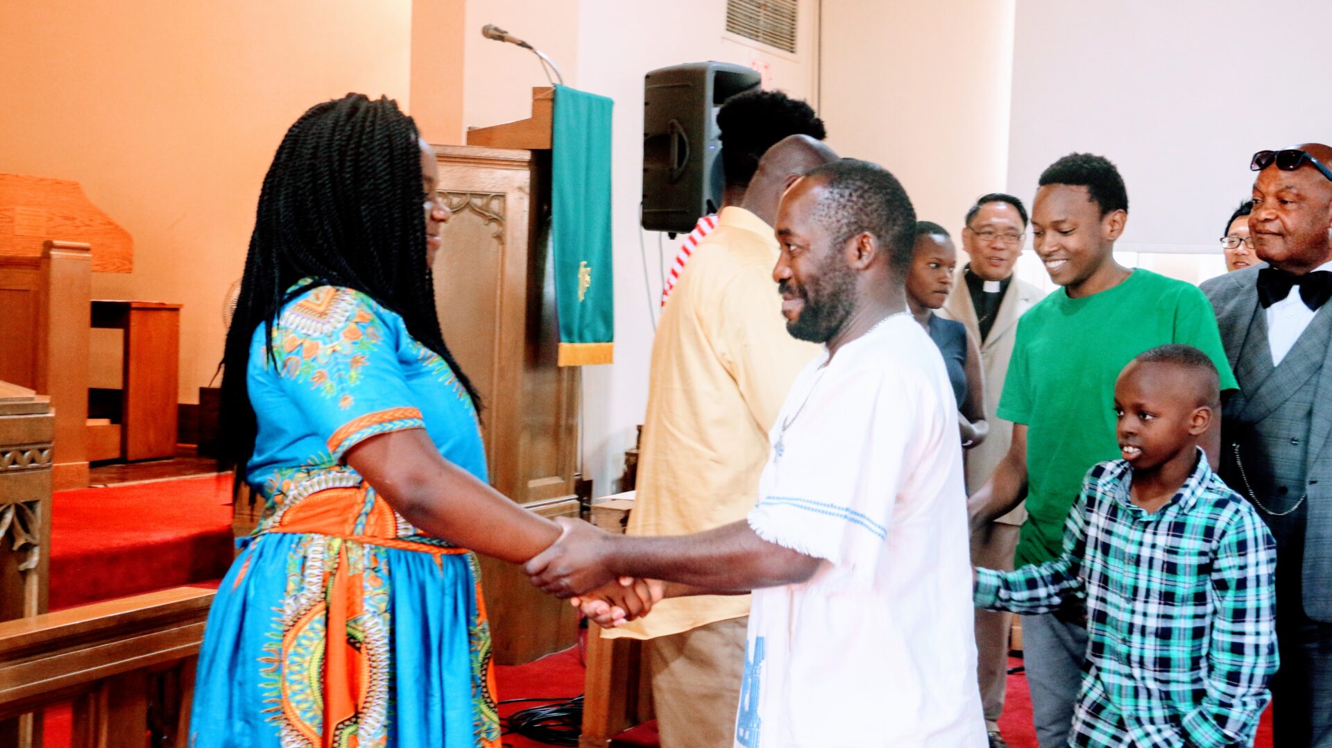 A Man Greeting a Woman Inside the Church