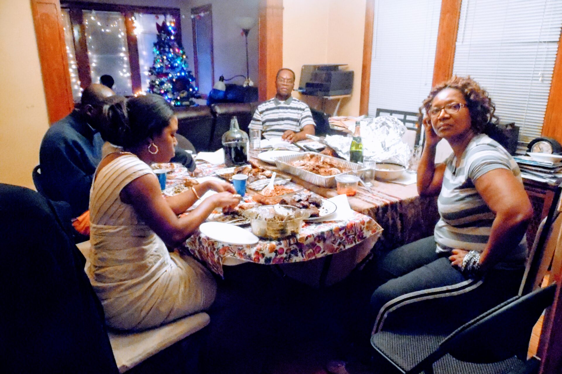 Four Individuals Having Dinner