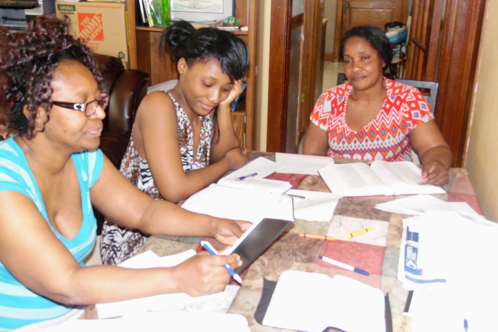 Three Women Doing Paperwork