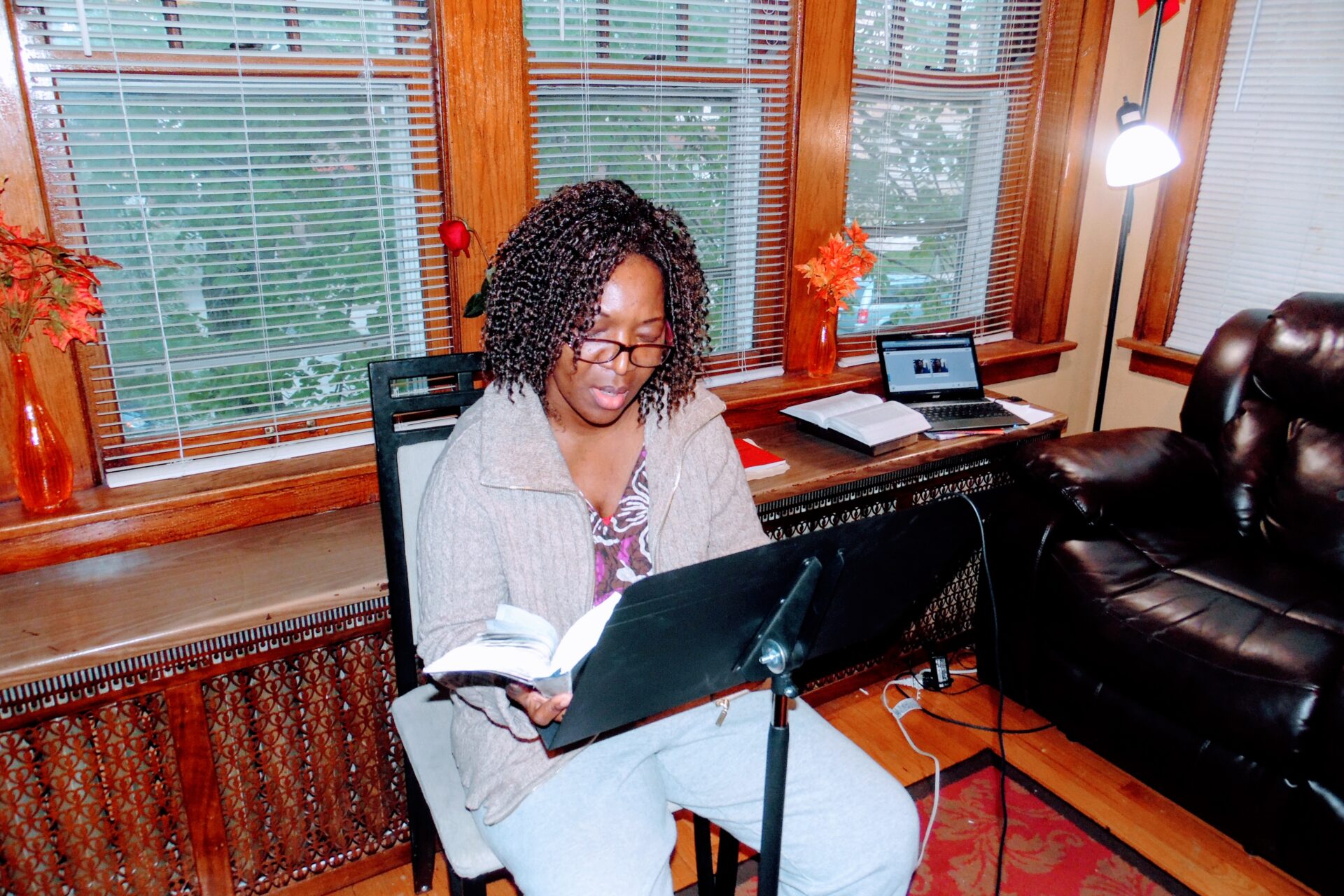 A Woman Sitting and Reading