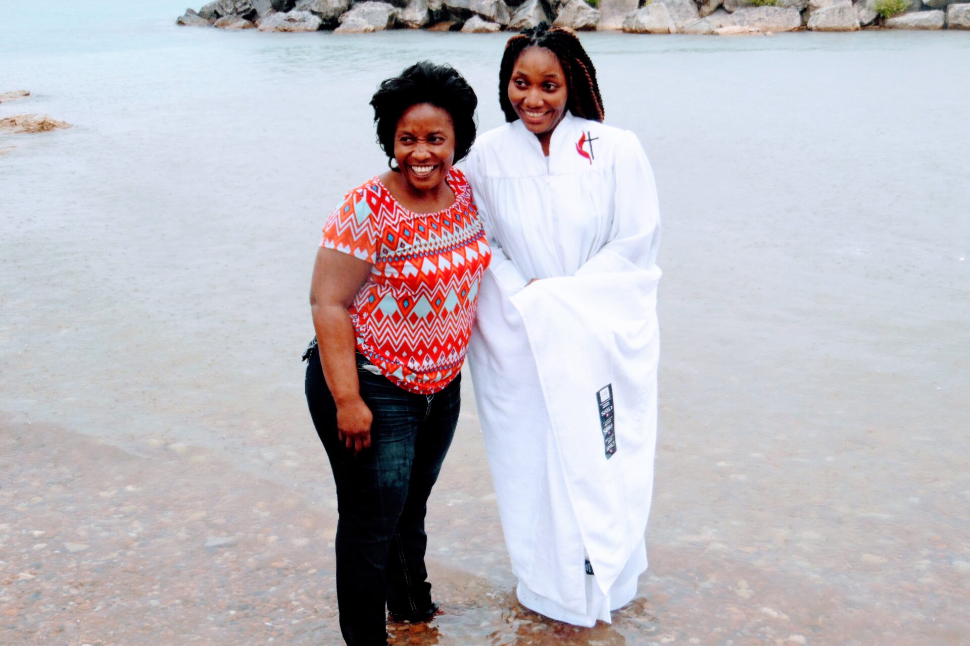 An Old Woman Beside a Woman Wearing White