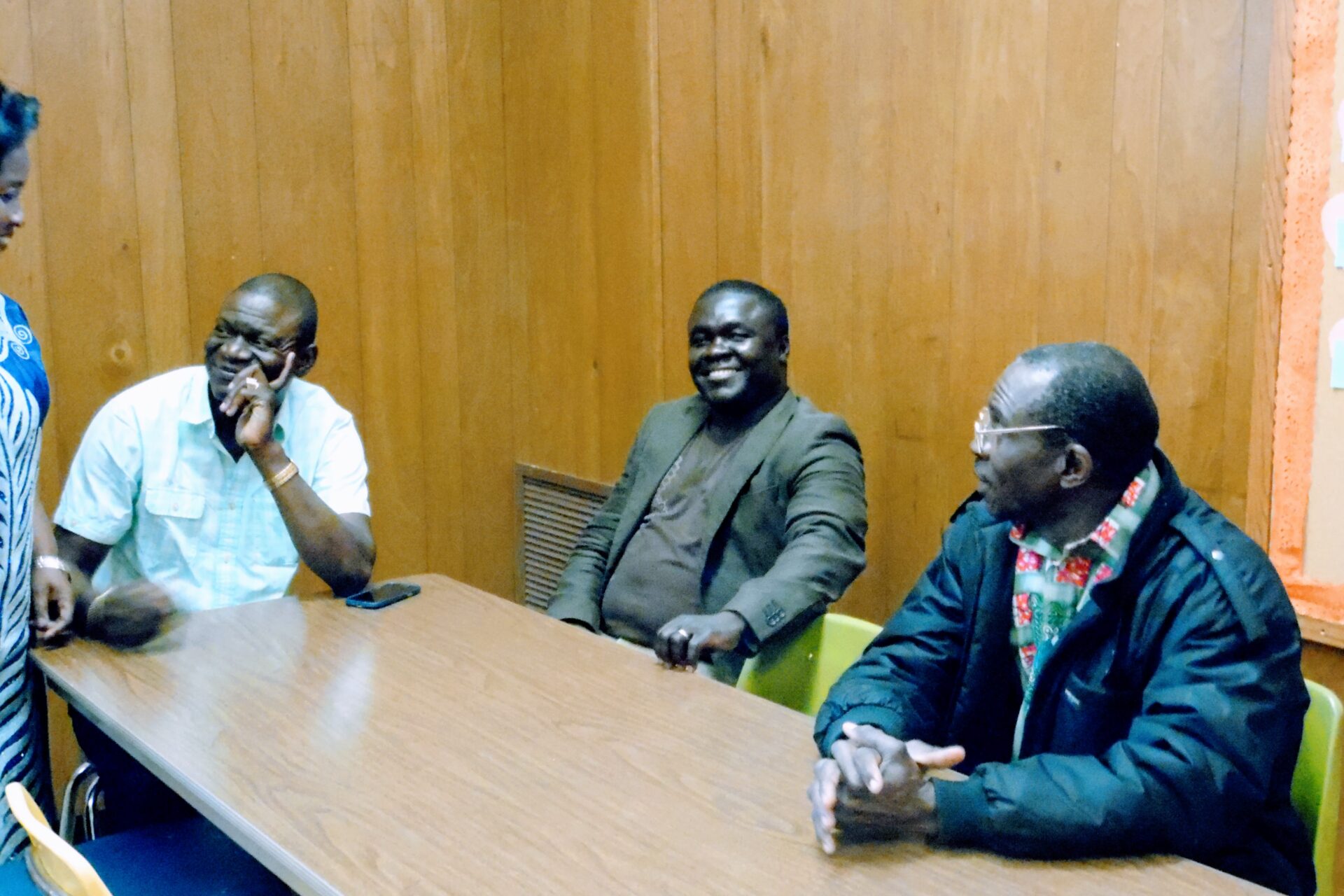 Three Men Sitting