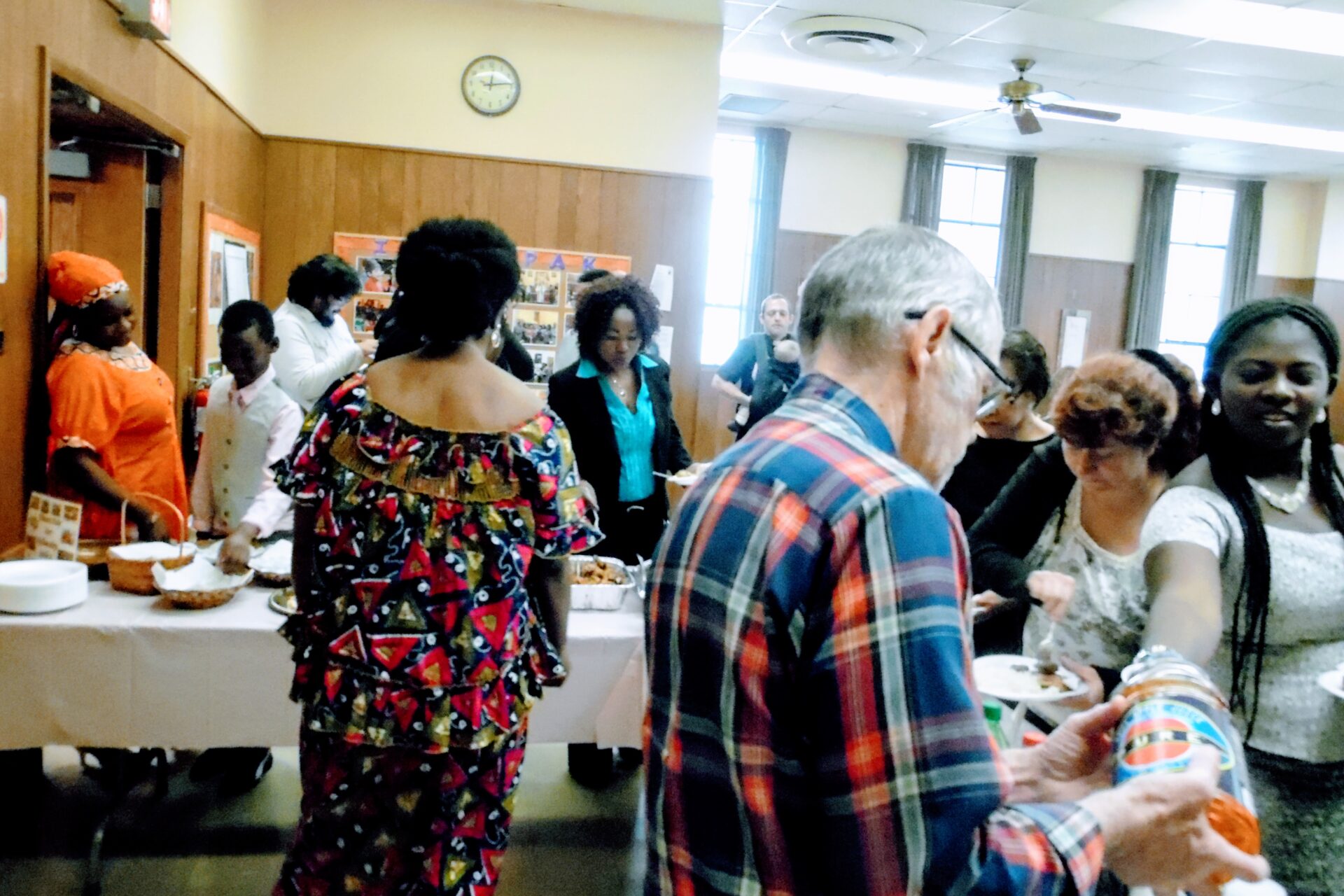 People Lining Up Getting Their Food