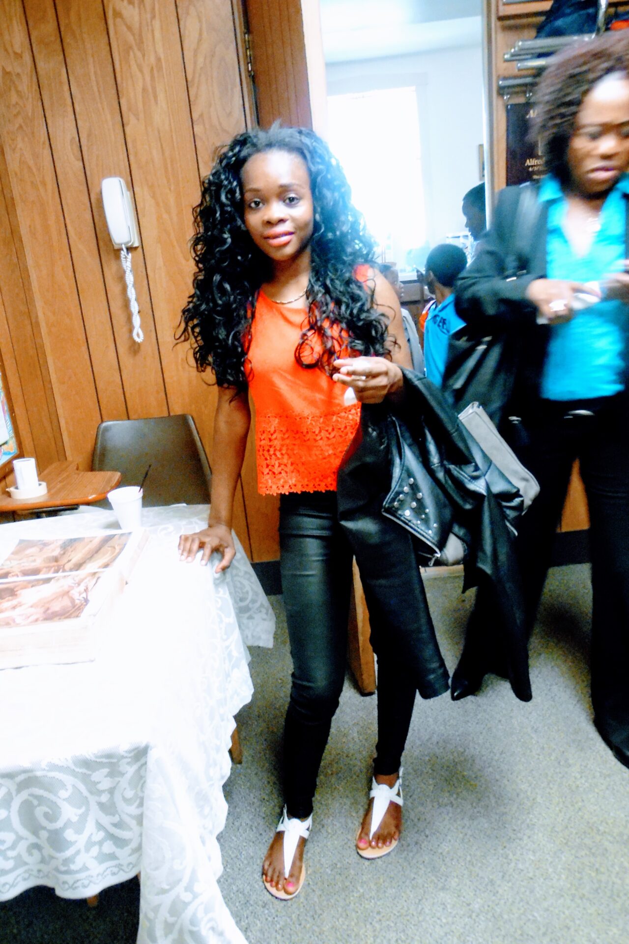 A Woman Wearing an Orange Blouse