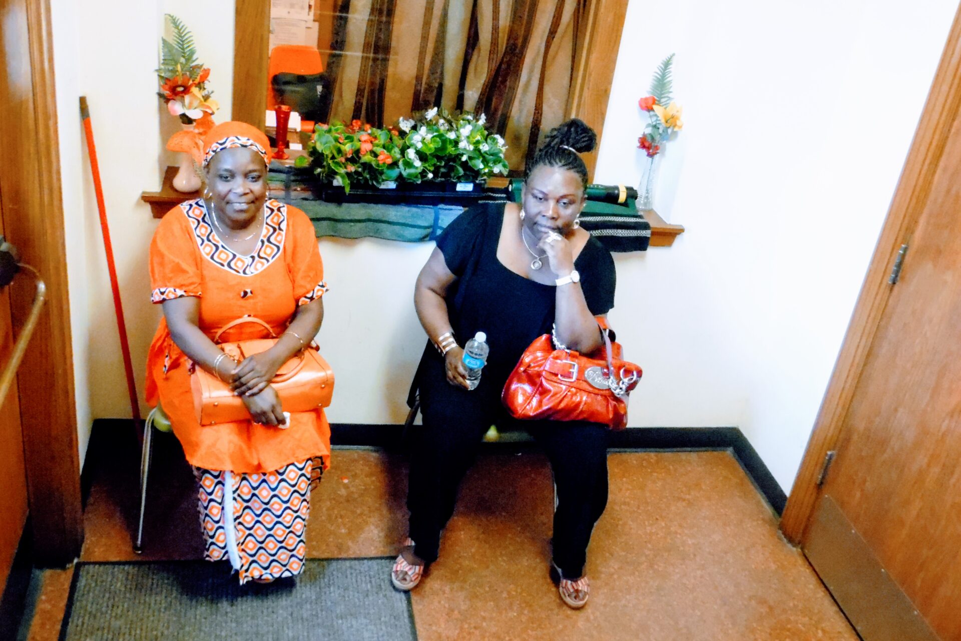 Two Women Sitting Beside Each Other