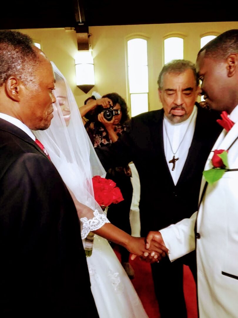 A Groom Holding Her Bride